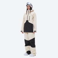 
                  
                    Colorblock snowboard jacket and pants set - cream and black colorblock, on-model front view, for powder and piste riding
                  
                