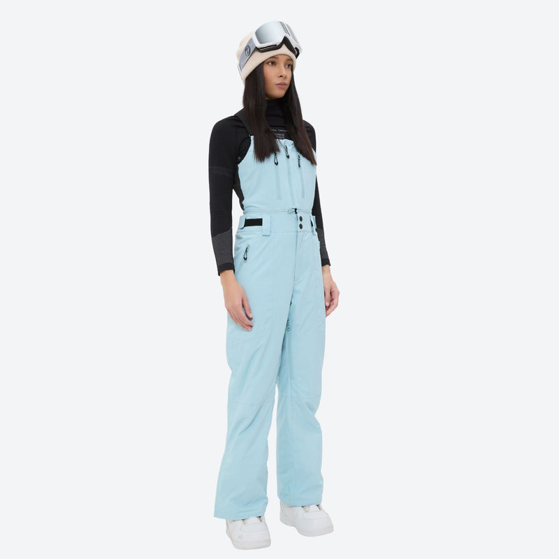 Unisex snowboard bib pants with snow gaiters - ice blue bib pants with black top, for cold-weather winter sports