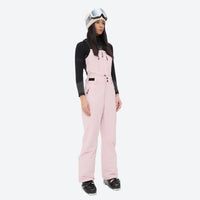 
                  
                    Unisex waterproof 3L snow bib pants - pink bib pants with black top, on-model front view, for powder and piste riding
                  
                