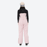 
                  
                    Unisex snowboard bib pants with snow gaiters - pink bib pants with black top, on-model back view, for skiing and snowboarding
                  
                