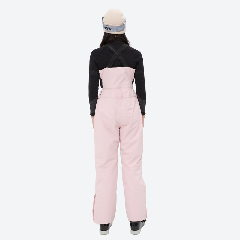 Unisex snowboard bib pants with snow gaiters - pink bib pants with black top, on-model back view, for skiing and snowboarding