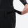 Unisex snowboard bib pants with snow gaiters - black, waist belt strap close-up with hand, for powder and piste riding