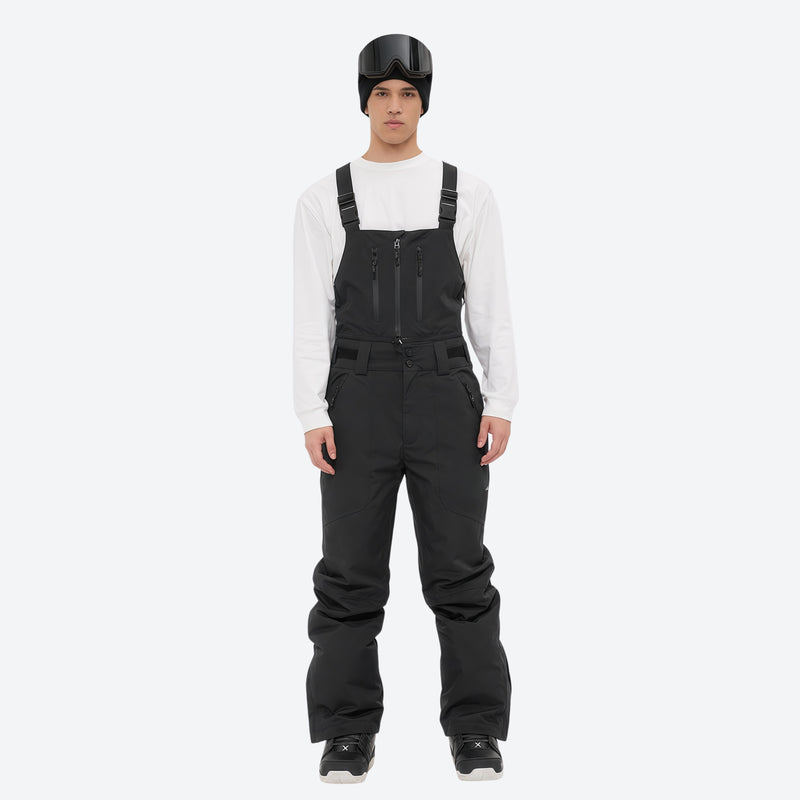 Men's breathable 3-layer suspender ski pants with pockets - black bib snow pants with white top, full-body front view