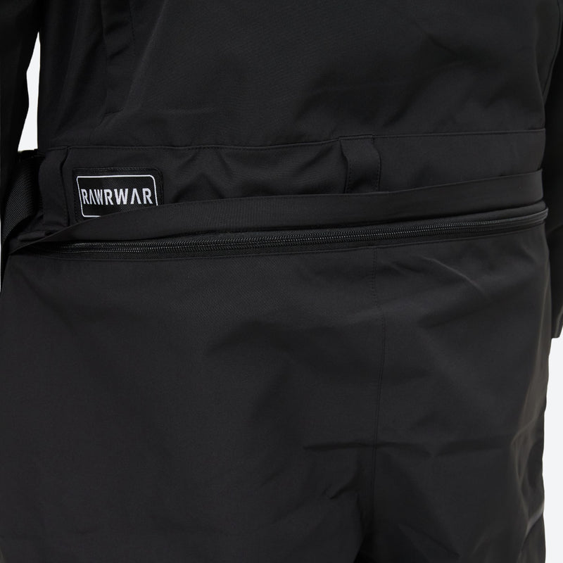 Unisex waterproof one-piece snow suit - black one-piece suit, waistband label close-up detail, for cold-weather winter sports