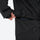 Unisex waterproof one-piece snow suit - black one-piece suit, waist belt close-up with hand, for skiing and snowboarding
