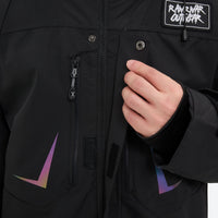 
                  
                    Unisex waterproof one-piece snow suit - black one-piece suit, chest zip close-up with hand, for cold-weather winter sports
                  
                