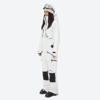 
                  
                    One-piece snowboard suit with knee reinforcement - white one-piece suit, on-model side view, for skiing and snowboarding
                  
                