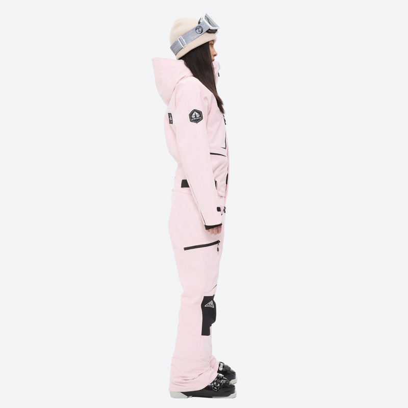 Unisex waterproof one-piece snow suit - pink one-piece suit, on-model side view, for powder and piste riding