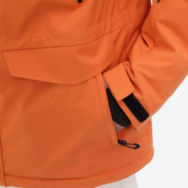 Men's 2-layer snowboard jacket and pants - orange, pocket flap and cuff close-up detail, for resort and backcountry days