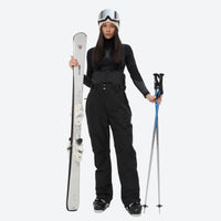 
                  
                    Women's breathable snow jacket with suspender pants - black snow pants, for cold-weather winter sports
                  
                