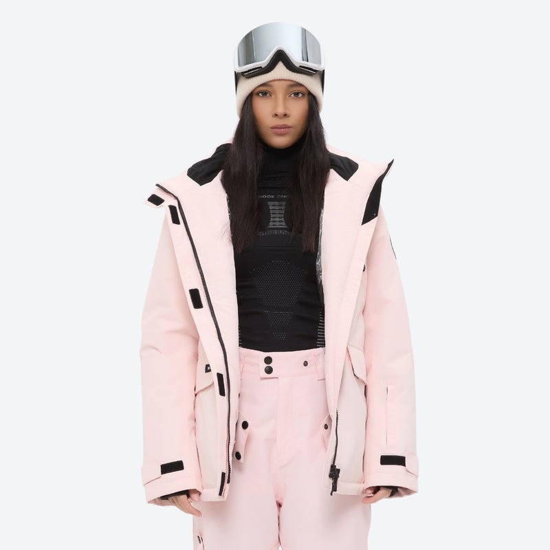 Women's waterproof 2L ski jacket and pants set - light pink, open front interior lining detail, for snowy mountain travel