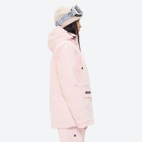 
                  
                    Women's 2-layer insulated ski suit - light pink, on-model side view, for resort and cross-country days
                  
                