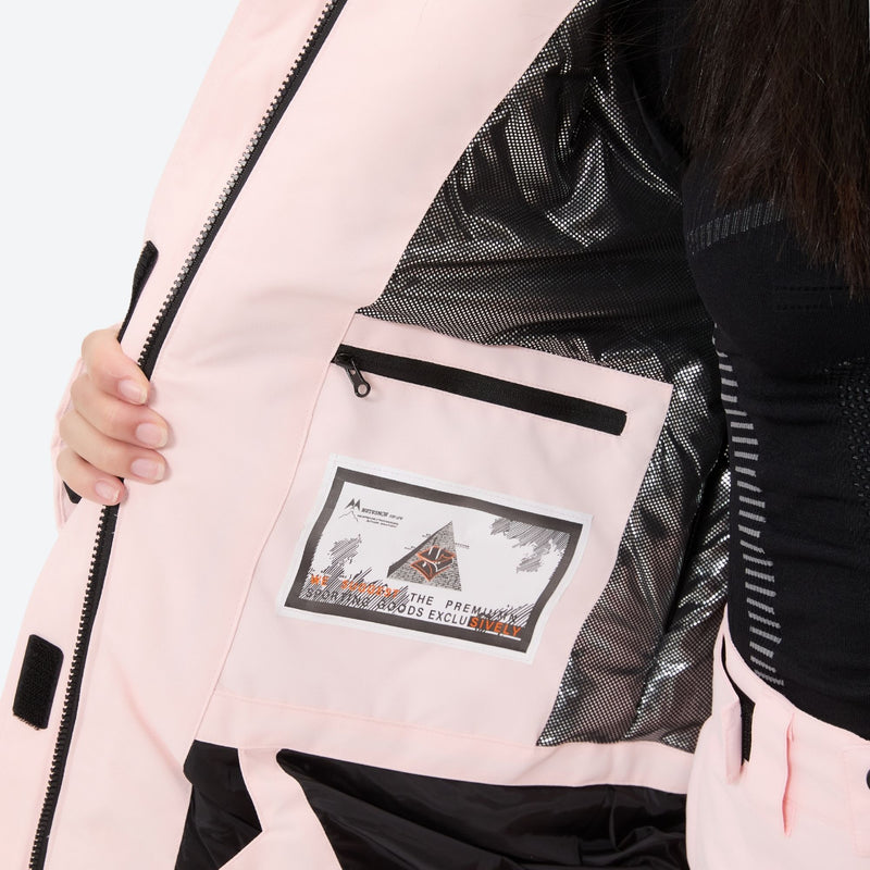 Women's 2-layer insulated ski suit - light pink, interior zip pocket close-up with hand, for resort and cross-country days