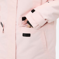 
                  
                    Women's waterproof 2L ski jacket and pants set - light pink, sleeve pocket close-up with hand, for skiing and snowboarding
                  
                