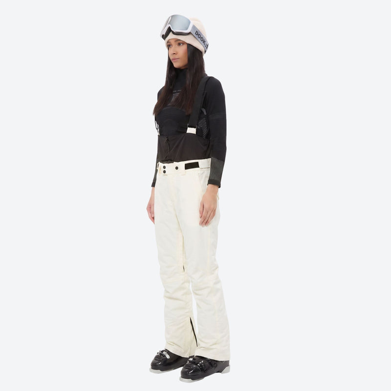 Women's breathable snow jacket with suspender pants - cream snow pants, on-model side view, for resort and cross-country days