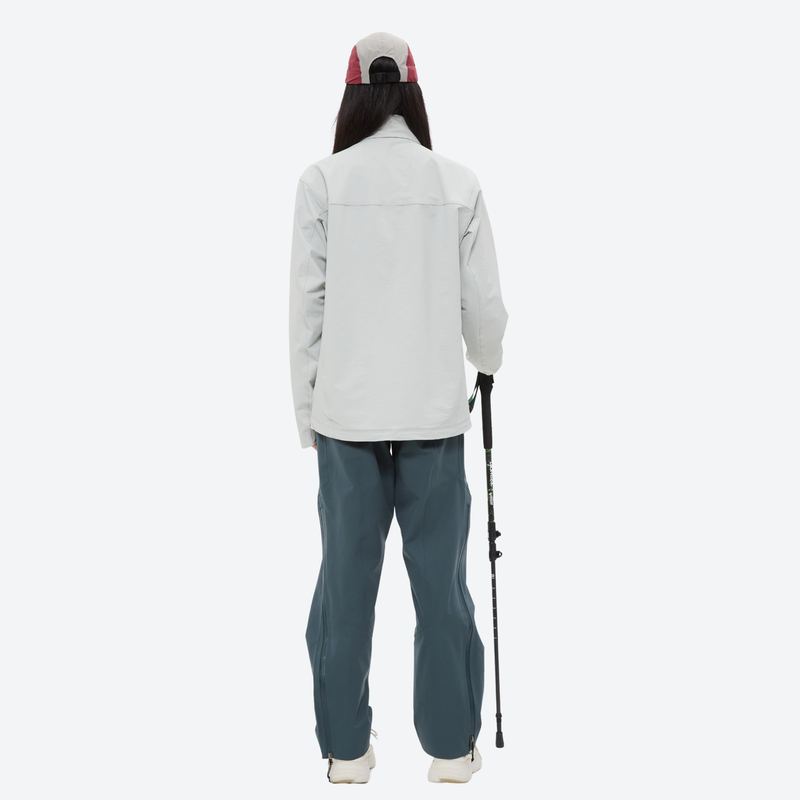 Women's light water-repellent hiking jacket - white softshell jacket, on-model back view, for light rain protection