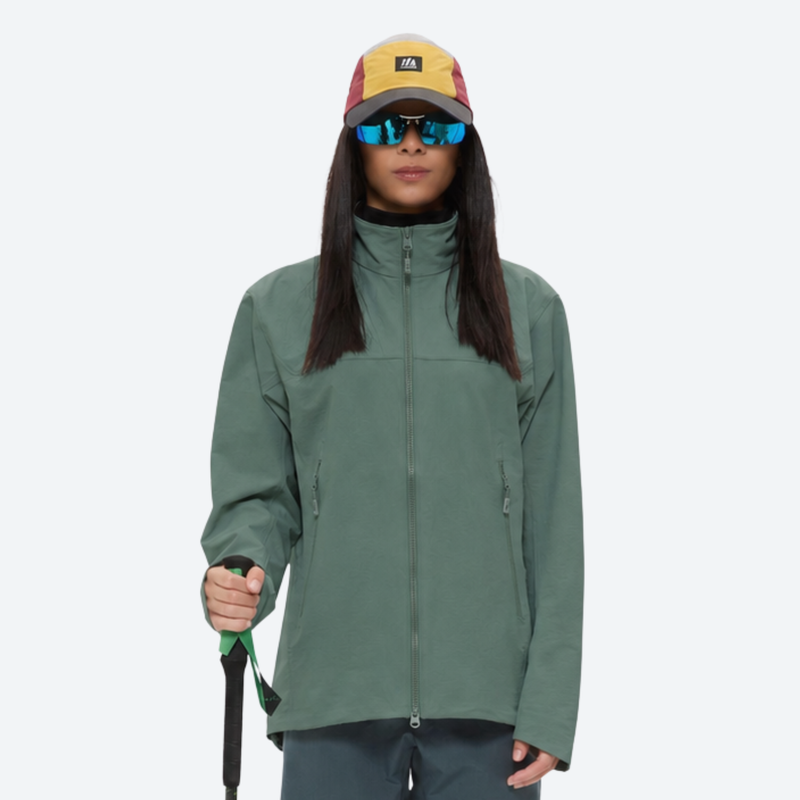 Women's waterproof softshell lightweight jacket - green softshell jacket, on-model front view, for travel and daily commute