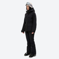 
                  
                    Women's waterproof 3L ski jacket and pants set - black jacket with black pants, on-model side view, for snowy mountain travel
                  
                