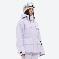 
                  
                    Women's 3-layer breathable ski suit - lavender, on-model hood side view, for skiing and snowboarding
                  
                
