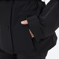 
                  
                    Women's waterproof 3L ski jacket and pants set - black, side pocket close-up with hand, for resort and cross-country days
                  
                