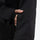 Women's waterproof 3L ski jacket and pants set - black, cuff close-up with hand, for snowy mountain travel