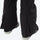 Women's breathable striped ski jacket with bibs - black, hem zip vent over boot close-up detail, for skiing and snowboarding