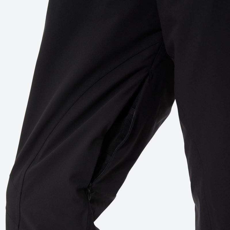 Women's waterproof 3L snow jacket and bib pants - black, thigh zip vent close-up detail, for cold-weather winter sports