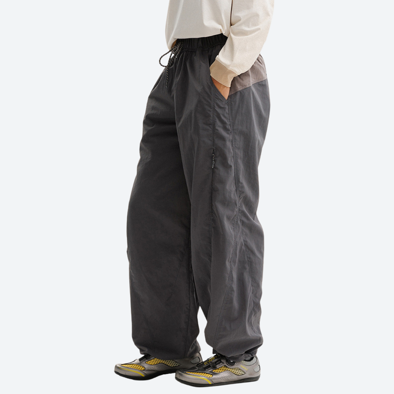 Breathable loose-fit trail pants with mesh lining - dark gray hiking pants with white top, for travel and camping