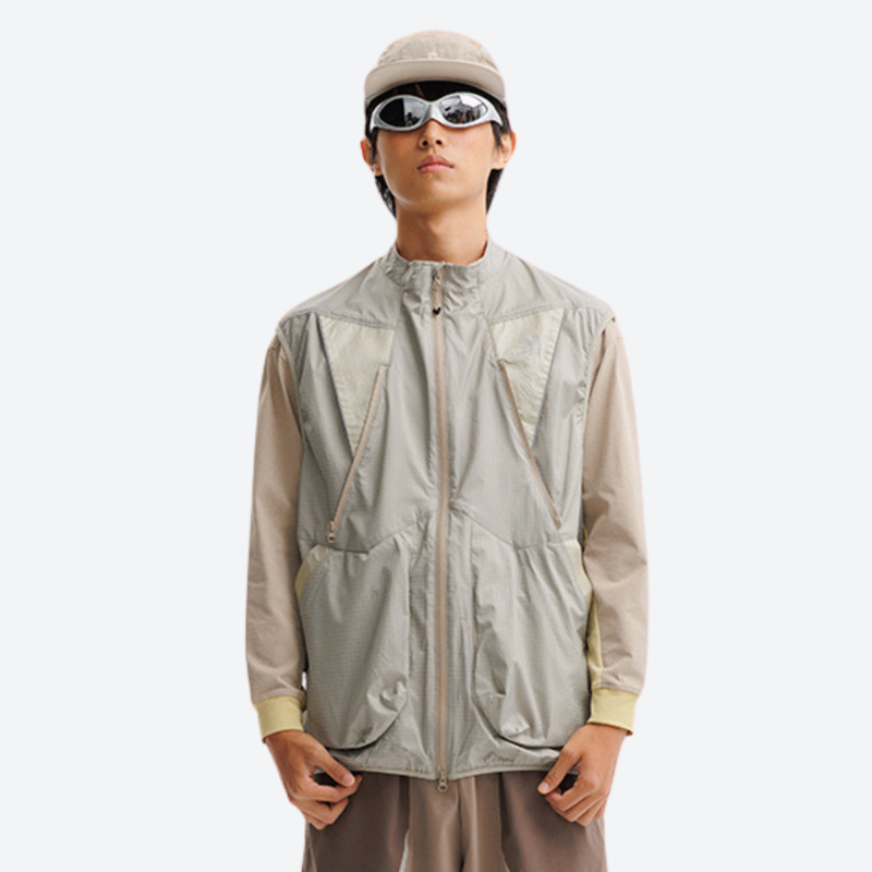 Breathable 2-way wear shell with laser-cut back pocket - sage gray vest, on-model front view, for skiing and snowboarding