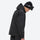 Men's waterproof 2L snow jacket and pants series - black jacket, side view bending forward, for resort and street wear