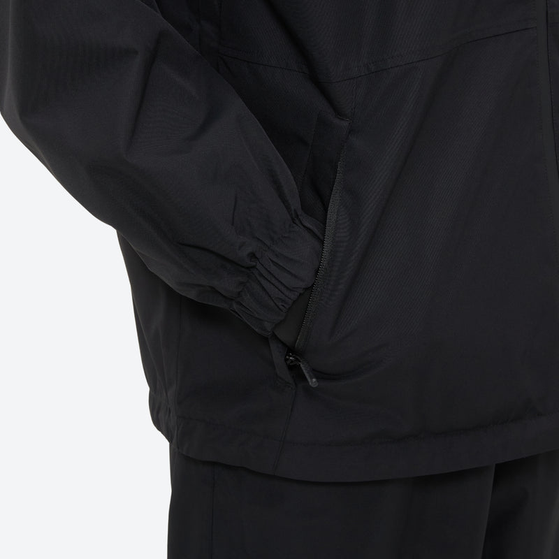 Breathable minimalist 2-layer ski jacket set - black, hem cinch close-up detail, for cold-weather winter sports