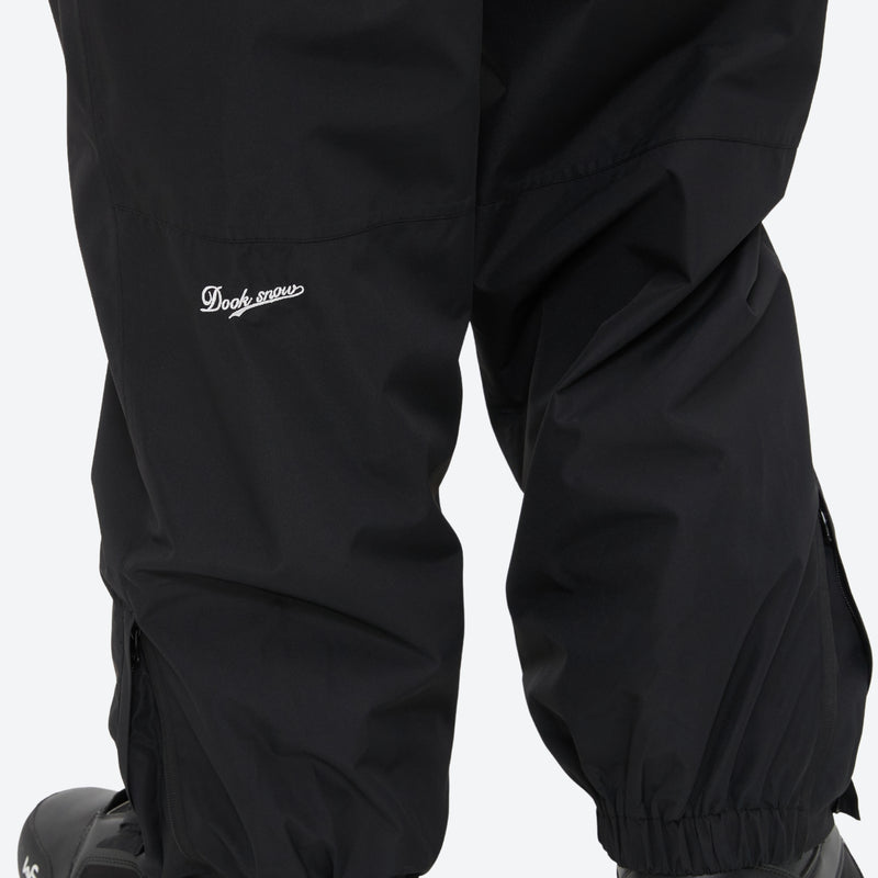 Men's minimalist breathable ski jacket set - black snow pants, leg print close-up detail, for skiing and snowboarding