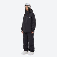 
                  
                    Breathable minimalist 2-layer ski jacket set - black jacket with black pants, for powder days and winter commute
                  
                