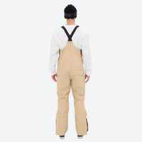 
                  
                    Men's waterproof 3L bib snow pants - tan bib snow pants with white top, on-model back view, for powder and piste riding
                  
                