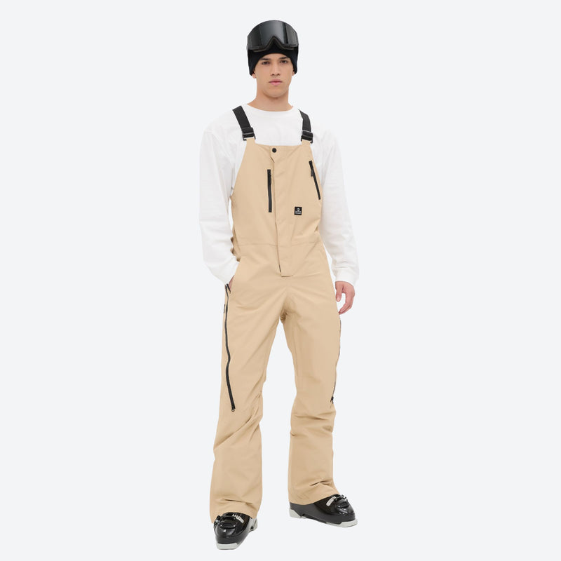 Men's breathable 3-layer suspender ski pants - tan bib snow pants with white top, for resort and backcountry days