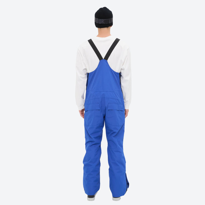 Men's minimalist bib snowboard pants with gaiters - blue bib snow pants with white top, for cold-weather winter sports