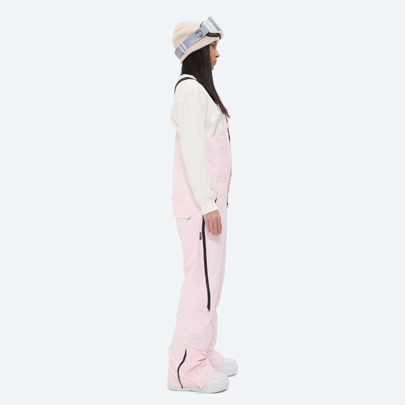 Women's minimalist bib snowboard pants with gaiters - pink bib snow pants with white top, for resort and backcountry days