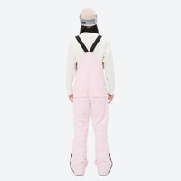 
                  
                    Women's waterproof 3L bib snow pants - pink bib snow pants with white top, on-model back view, for powder and piste riding
                  
                