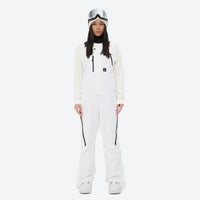 
                  
                    Women's minimalist bib snowboard pants with gaiters - white bib snow pants with white top, for cold-weather winter sports
                  
                