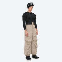 
                  
                    Men's 3-layer snowboard pants with jacket - tan snow pants with black top, for powder days and winter commute
                  
                