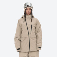 
                  
                    Women's waterproof 3L snow pants and jacket series - tan jacket, on-model front view, for cold-weather winter sports
                  
                