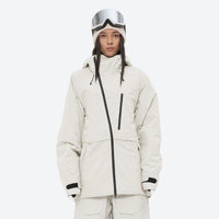 
                  
                    Women's 3-layer snowboard pants with jacket - white jacket, on-model front view, for resort and street wear
                  
                