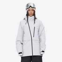
                  
                    Women's 3-layer snowboard pants with jacket - white jacket, on-model front view, for powder days and winter commute
                  
                