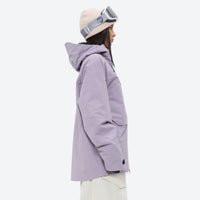 
                  
                    Women's breathable balloon snow pants set - lavender jacket, on-model hood side view, for skiing and snowboarding
                  
                