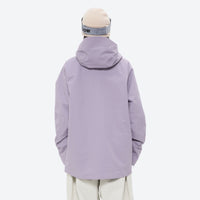 
                  
                    Women's 3-layer snowboard pants with jacket - lavender jacket, on-model back view, for resort and street wear
                  
                