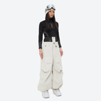 
                  
                    Women's waterproof 3L snow pants and jacket series - white snow pants with black top, for resort and street wear
                  
                