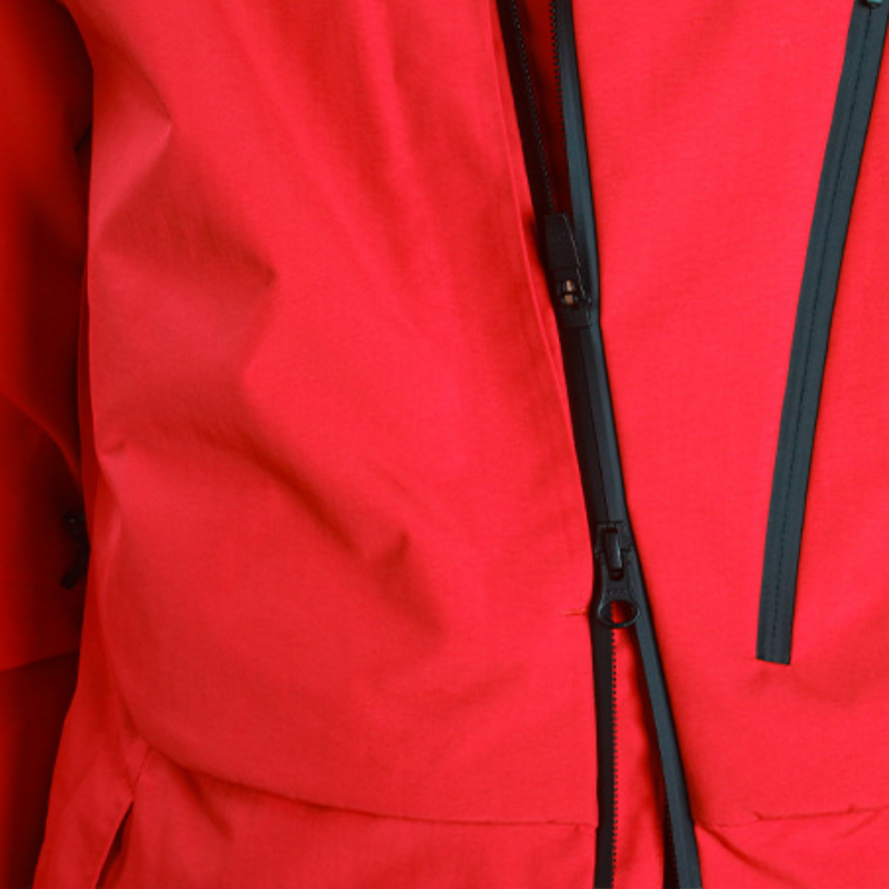 Women's waterproof 3L snow pants and jacket series - red, chest zip close-up detail, for powder days and winter commute
