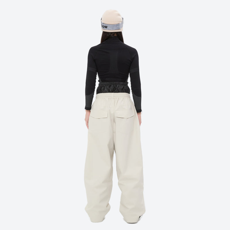Women's minimalist breathable ski jacket set - cream snow pants, on-model back view, for powder days and winter commute