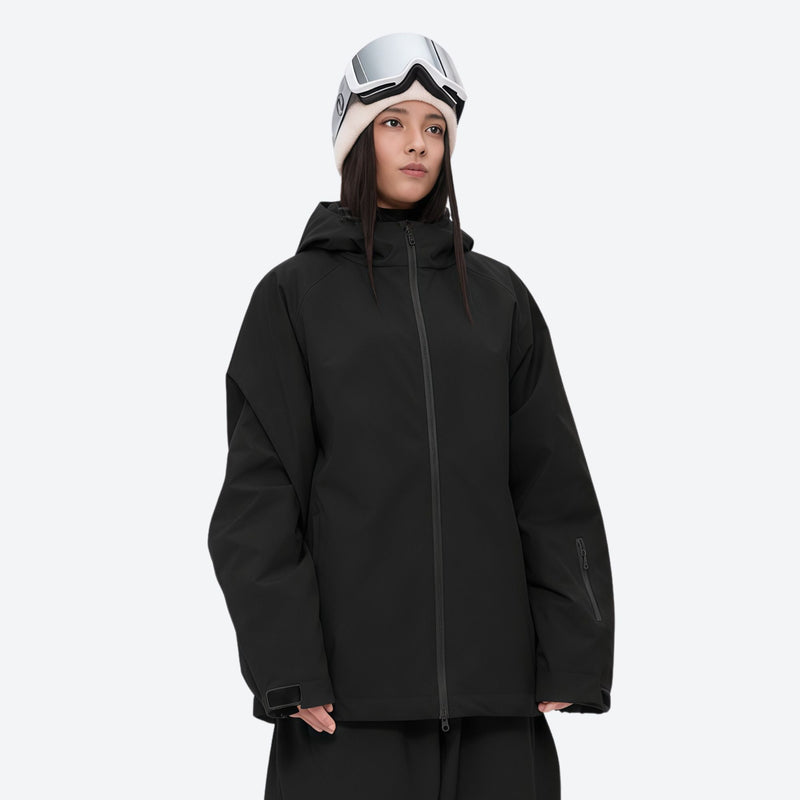 Women's 2-layer snowboard jacket and pants - black, on-model three-quarter front view, for resort and street wear