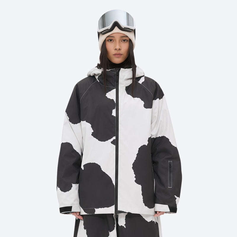 Women's 2-layer snowboard jacket and pants - cow print, on-model full-body front view, for resort and street wear